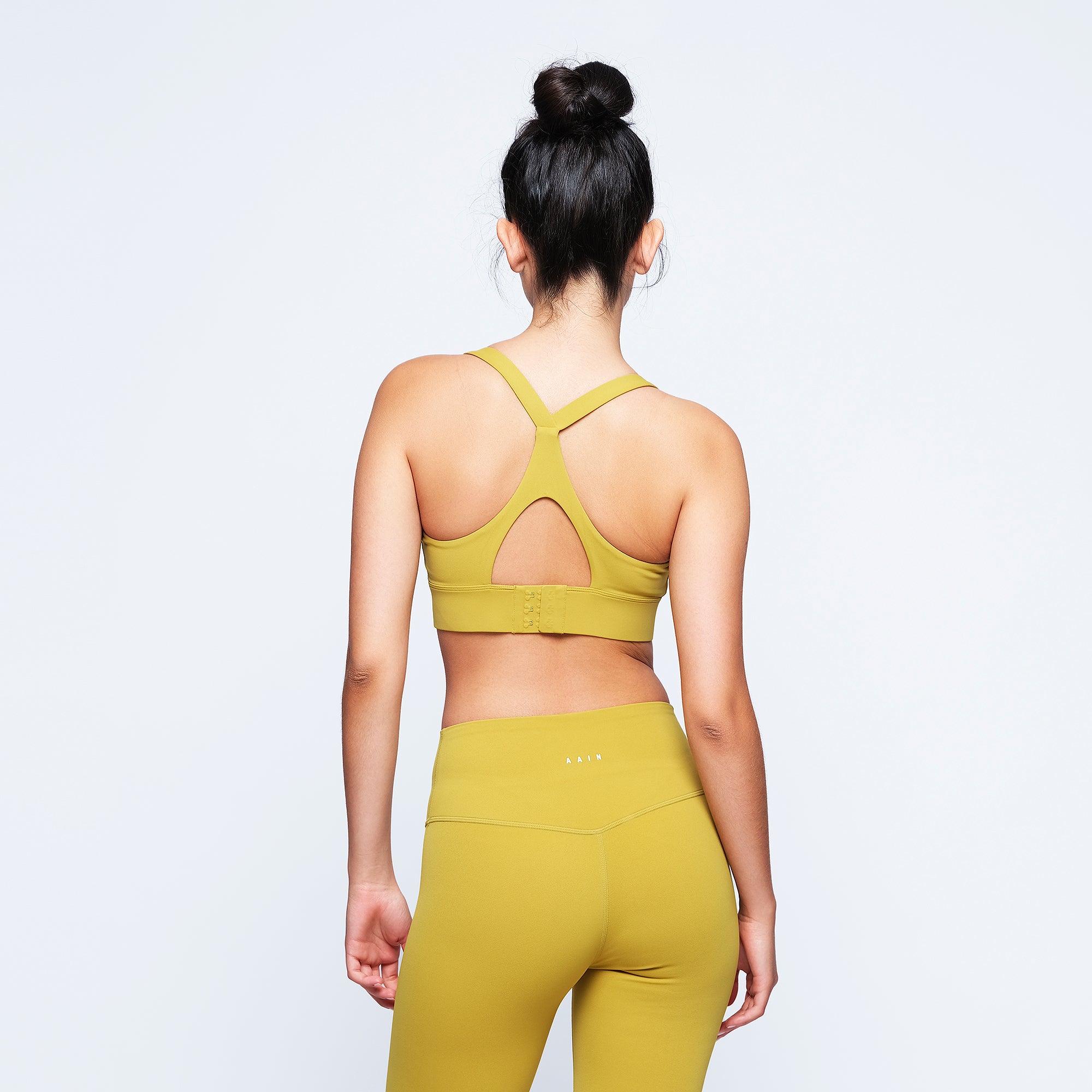 OLIVIA GREEN TOP DEPORTIVO AJUSTABLE